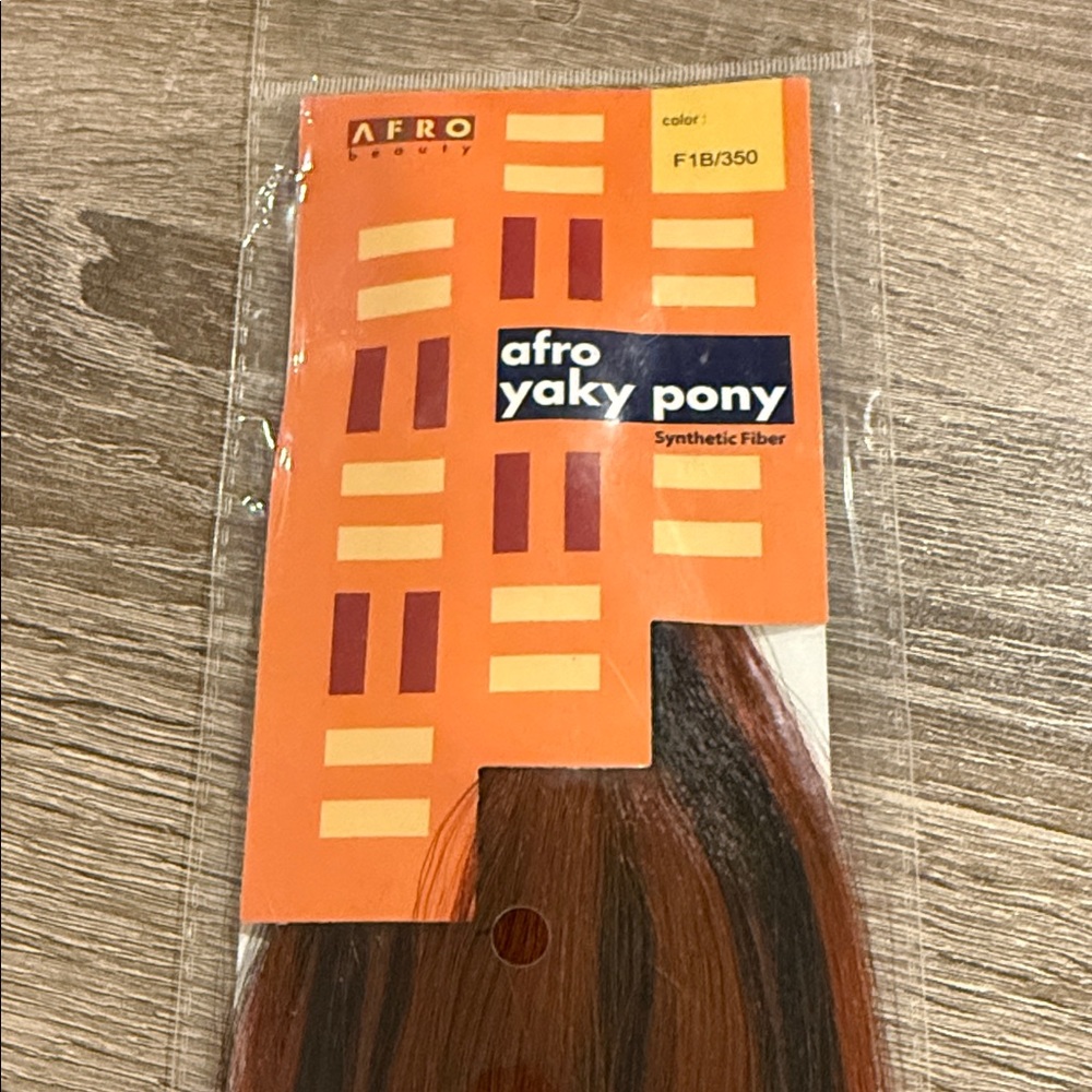 Afro Yaky synthetic hair extensions in color F1B/350